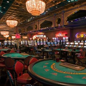 asian4d link app displayed on mobile phone screen showing live dealer table interface